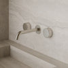 Modern Curved Wall-Mounted Faucet with Knob-Style Controls