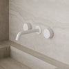 Modern Curved Wall-Mounted Faucet with Knob-Style Controls