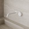 Modern Curved Wall-Mounted Faucet with Knob-Style Controls